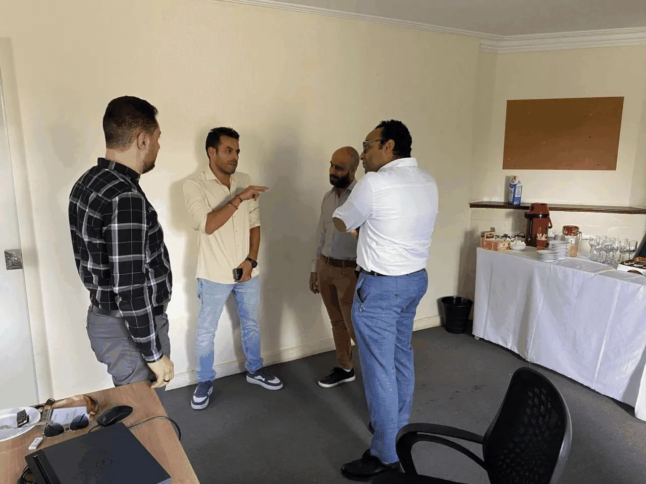 Attendees talking over coffee
